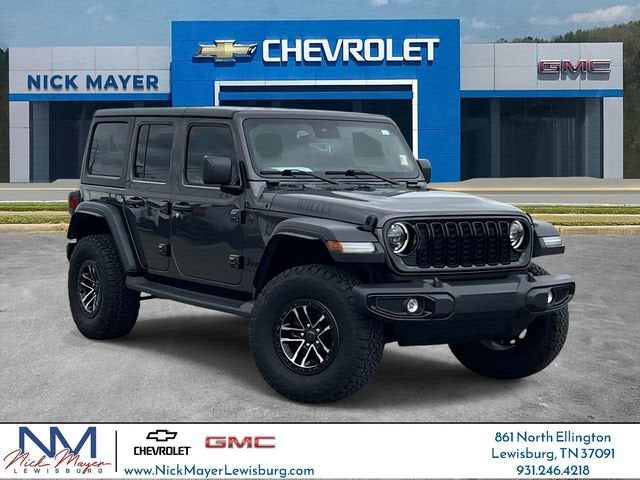 2024 Jeep Wrangler 4-Door Willys 4x4 in Gray — front three-quarter view