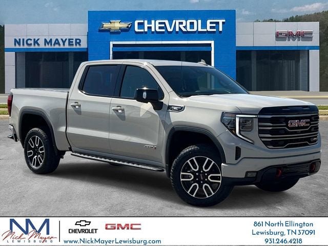 2026 GMC Sierra 1500 AT4 in Coastal Dune — front three-quarter view